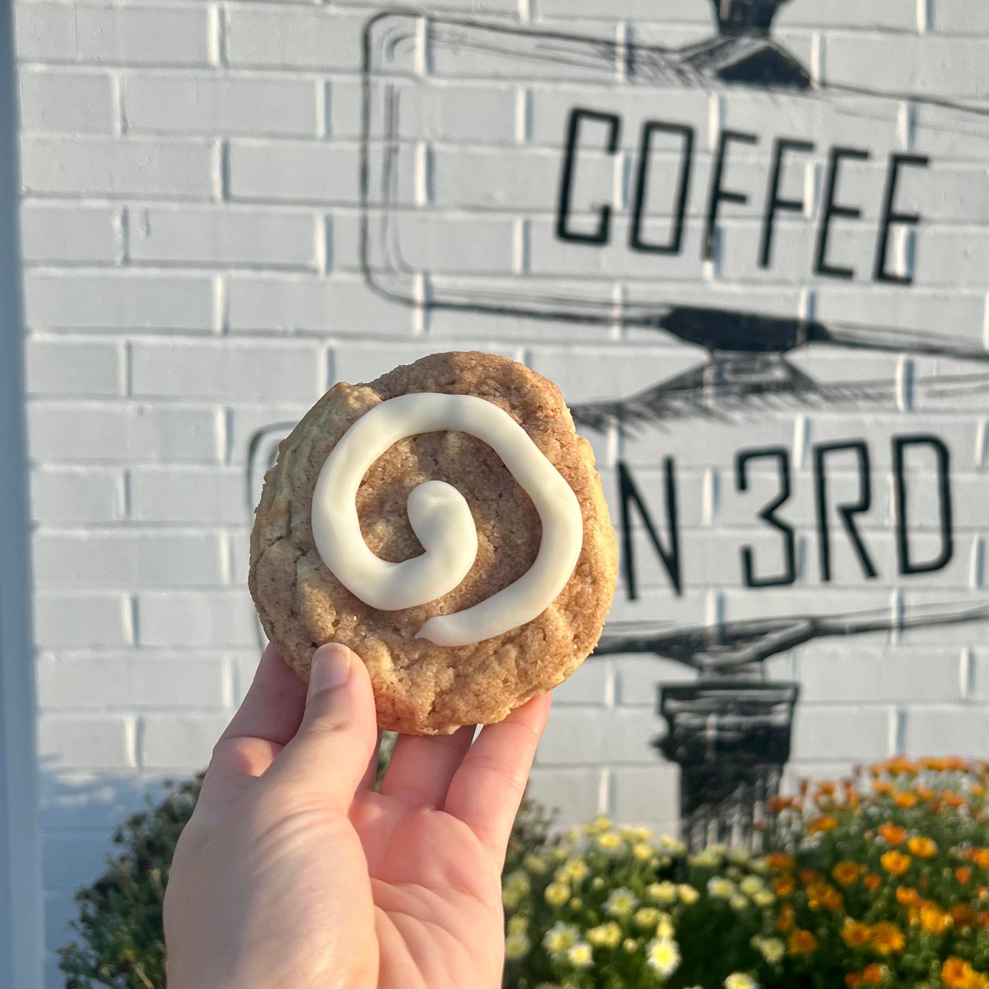 Are you ever craving a warm cinnamon roll, but don't have the time to go through all the hassle of baking one? Try one of our signature Cinnamon Roll Delight cookies instead! This perfect balance between cinnamon and cream cheese frosting is sure to satisfy that craving.