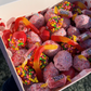 Adorable assortment of candied grapes covered in your favorite childhood candies such as Jolly Ranchers, Sour Skittles, and Nerds!  Flavors include grape, watermelon, strawberry, cotton candy, lemon, and sour.