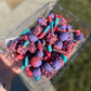Adorable assortment of candied grapes covered in your favorite childhood candies such as Jolly Ranchers, Sour Skittles, and Nerds!  Flavors include grape, watermelon, strawberry, cotton candy, lemon, and sour.