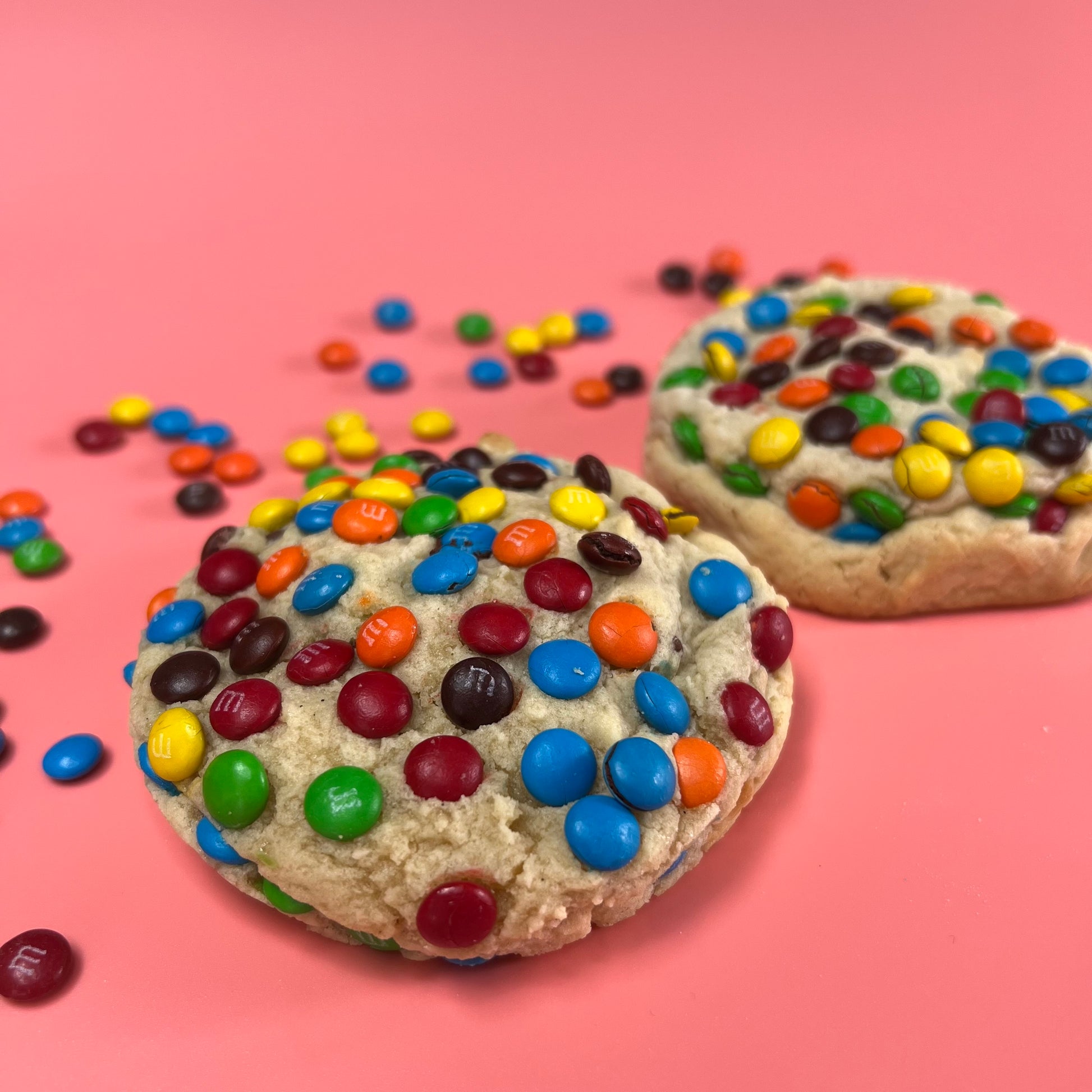 A sugar cookie dough filled to the brim with M&M candies.